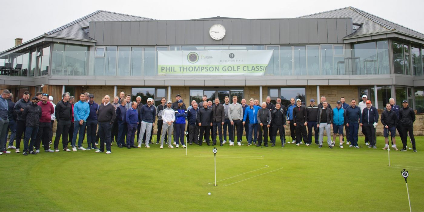 Group photo if the teams at the sixteenth Phil Thompson Golf Classic in May 2022